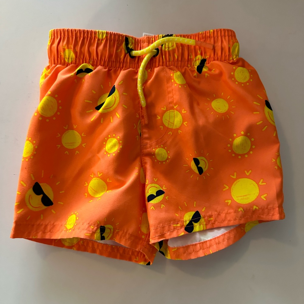 Bright orange swim trunks…perfect for pool days…you can spot these a mile away!